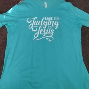 Leave the judging to Jesus shirt in a light blue color and size extra large